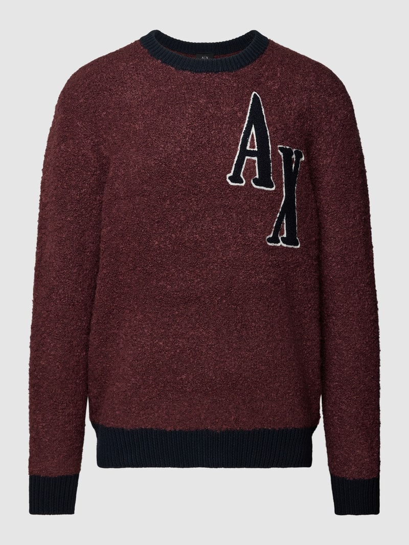 Strickpullover mit Label-Detail und Rundhalsausschnitt in bordeaux rot