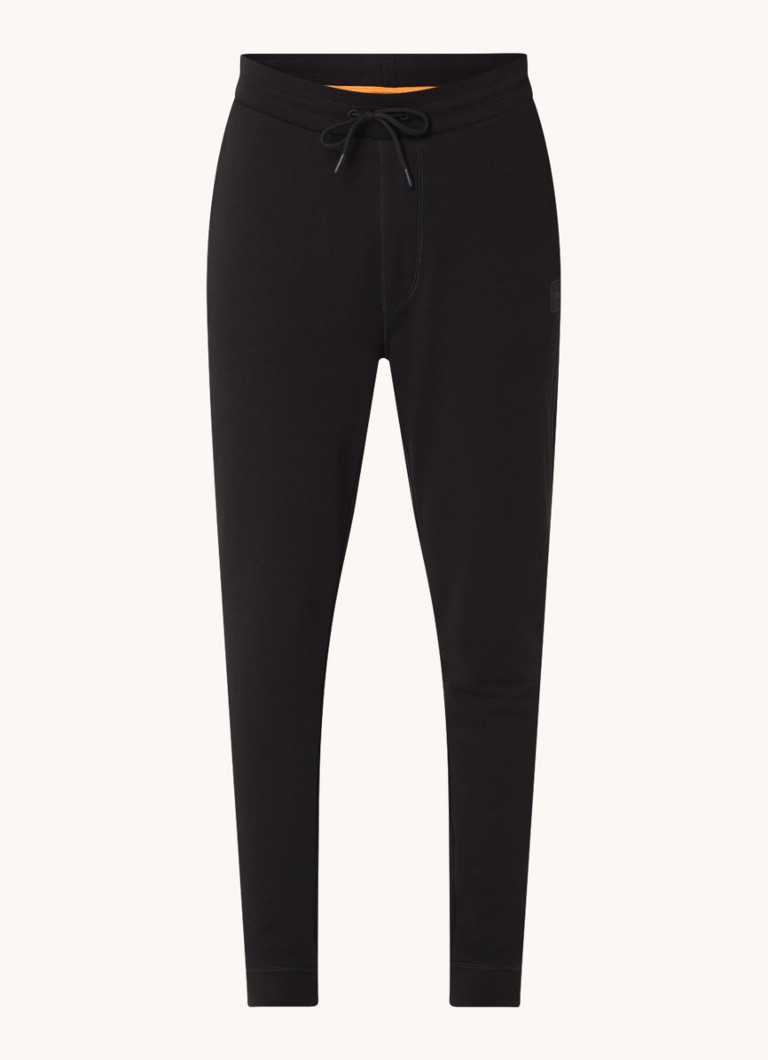 Pantaloni de trening slim fit de la HUGO BOSS, cu logo și buzunare laterale.