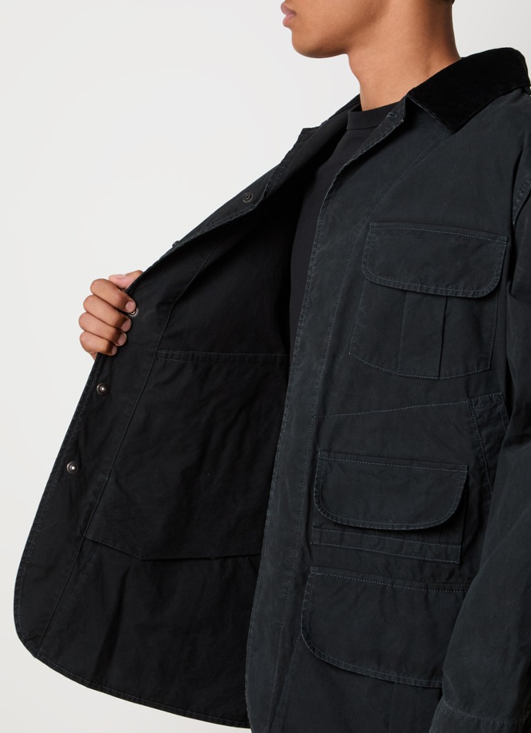 Parka Maison Margiela com bolsos no peito e com aba.