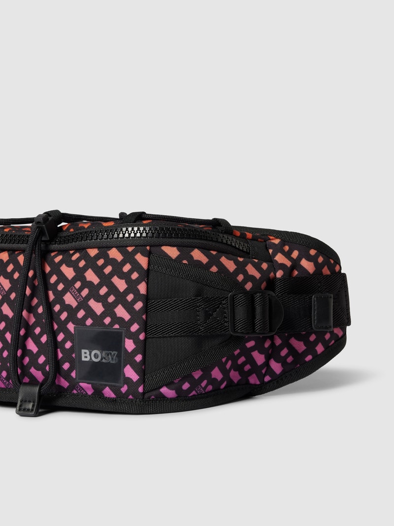 Bauchtasche mit Allover-Logo Modell 'Bumbag' - BOSS x Khaby 2.0 in dunkel orange