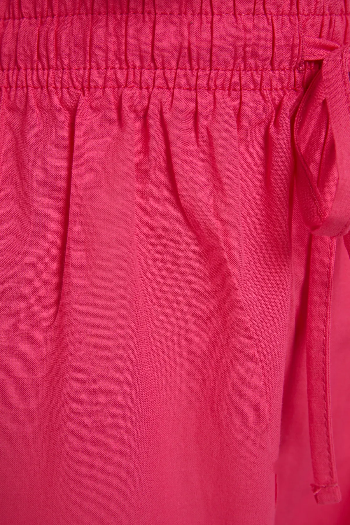Trendyol Collection  Rosa gewebtes, gebundenes Blusen-Shorts-Set aus 100 % Baumwolle TBESS21AU0481
