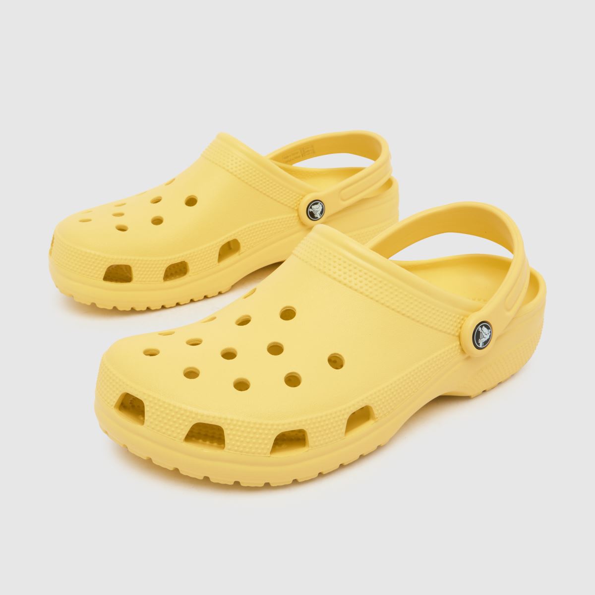 Crocs klasszikus klumpa szandál halványsárga színben