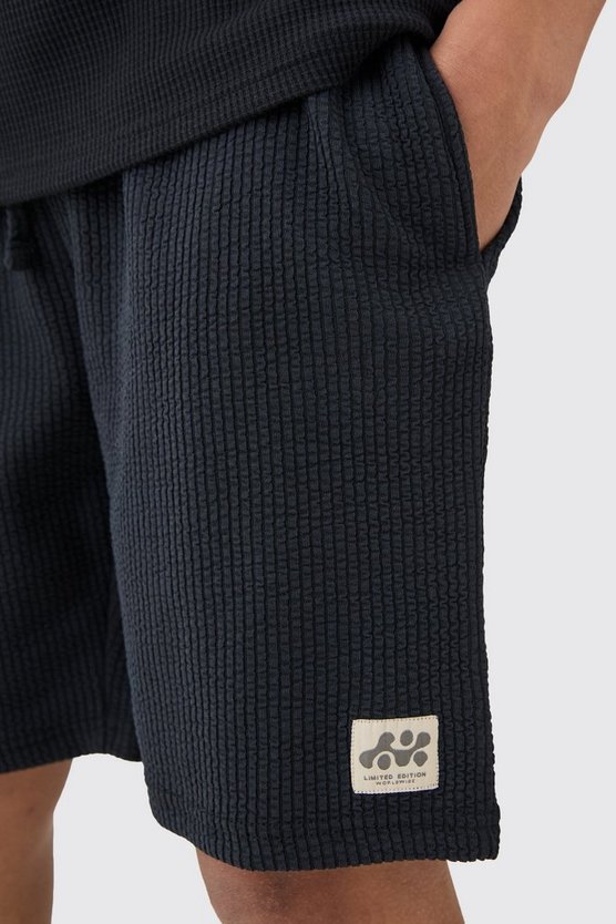 Lockere mittellange strukturierte Shorts