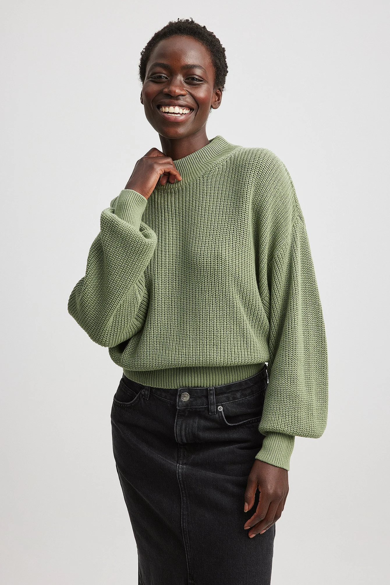 Strickpulli mit weiten Ärmeln