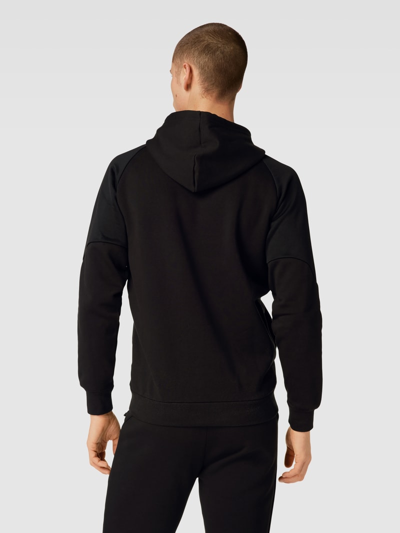 Hoodie mit Känguru-Tasche Modell 'PUMATECH Hoodie FL' in schwarz
