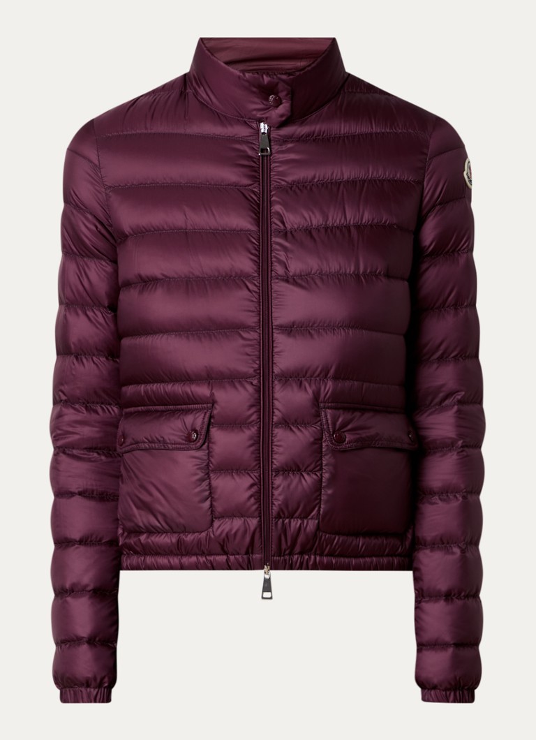 Giacca imbottita Moncler Lans con imbottitura in piuma e tasche con patta.