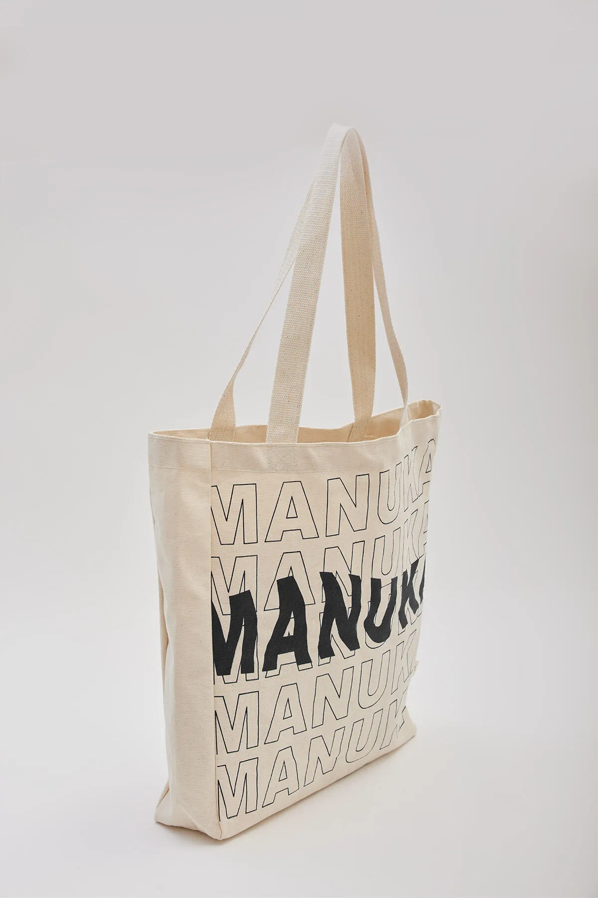 Manuka  Bedruckte Stofftasche mit Seitenfalten – Schwarz