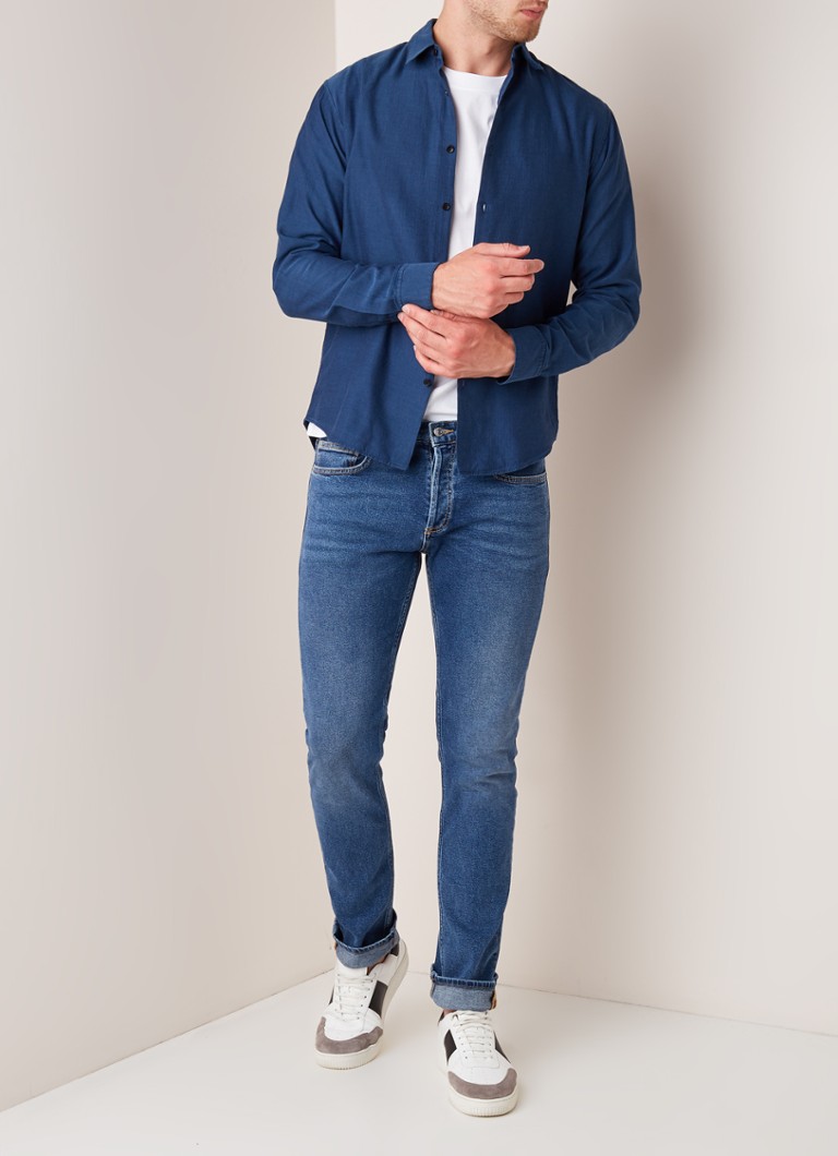 Obcisłe jeansy Sandro w stylu vintage.