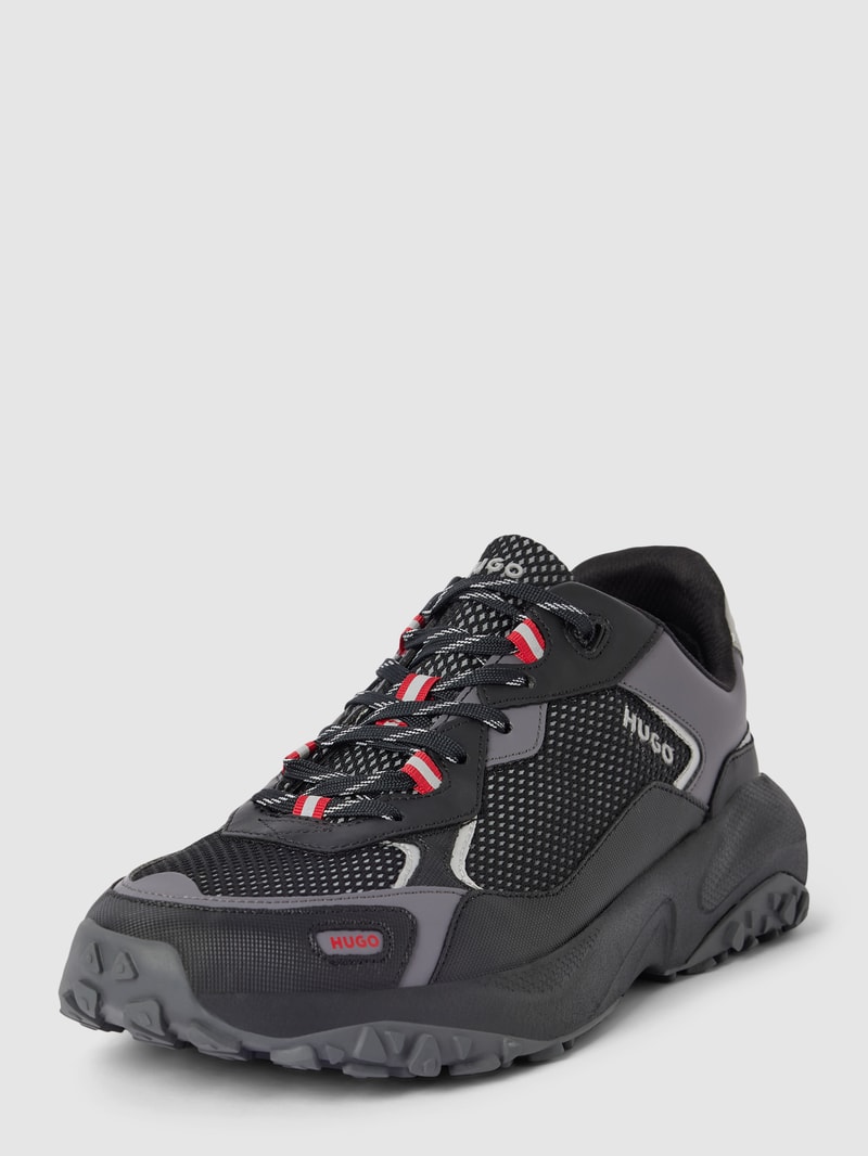 Sneaker mit Kontrastbesatz Modell 'pume' in schwarz