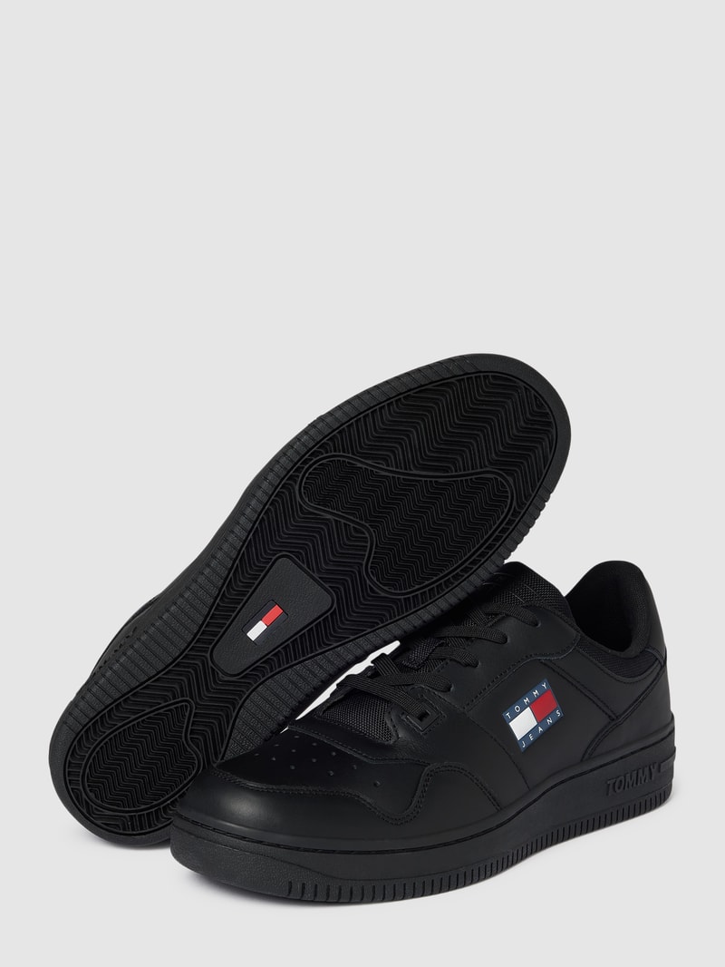 Sneaker aus Leder-Mix in schwarz