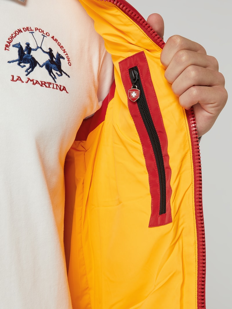 Steppweste mit Label-Applikation Modell 'SNOWDOME VEST' in rot