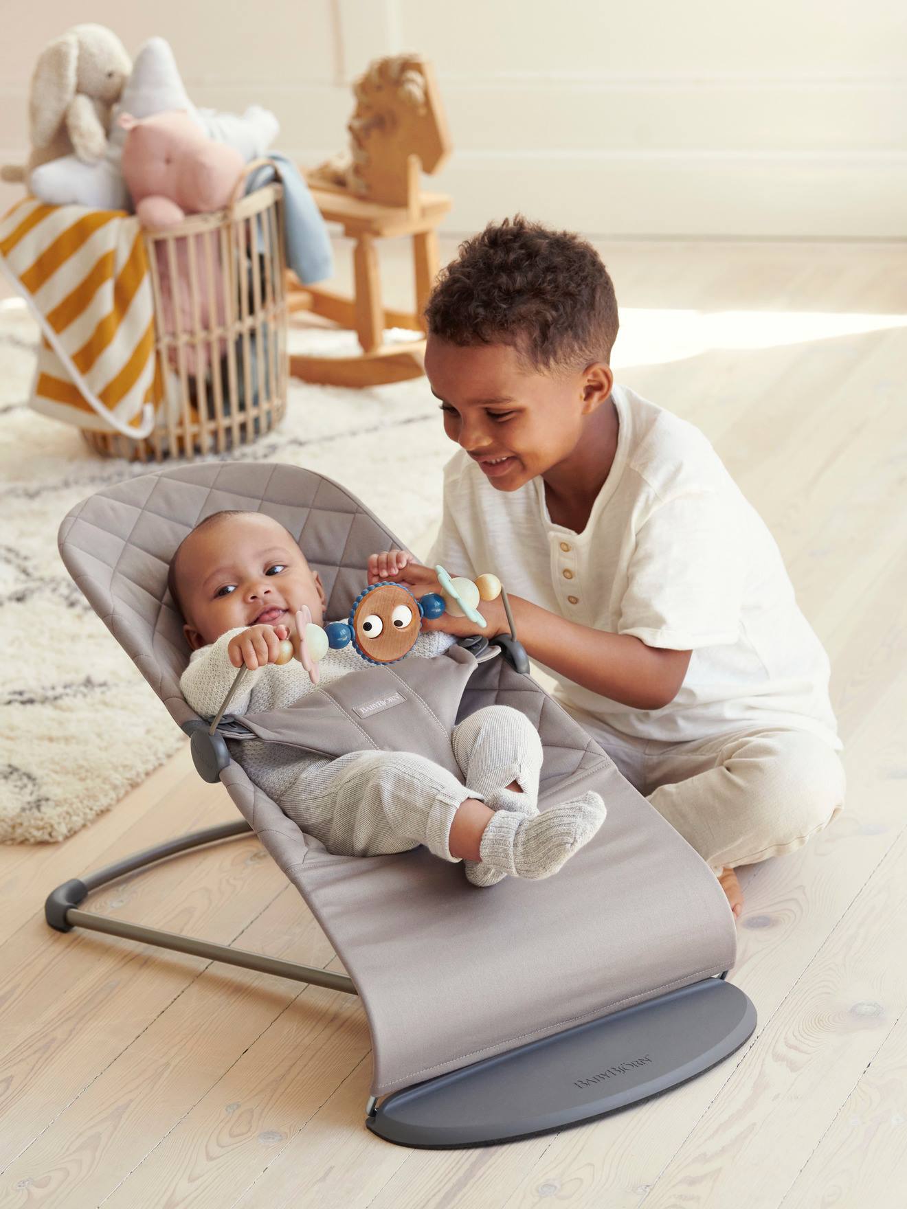 Arche de jeux BabyBjörn pour transat yeux espiegles pastels