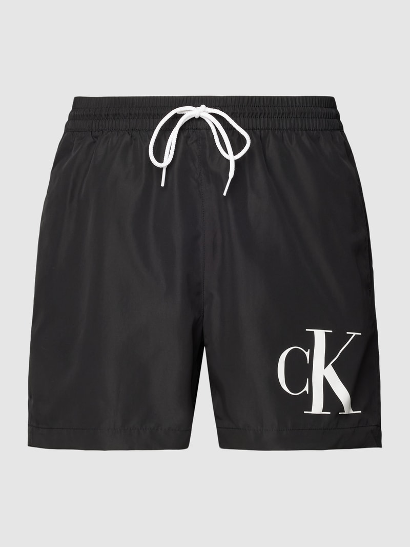 Badehose und Strandtuch im Set in schwarz