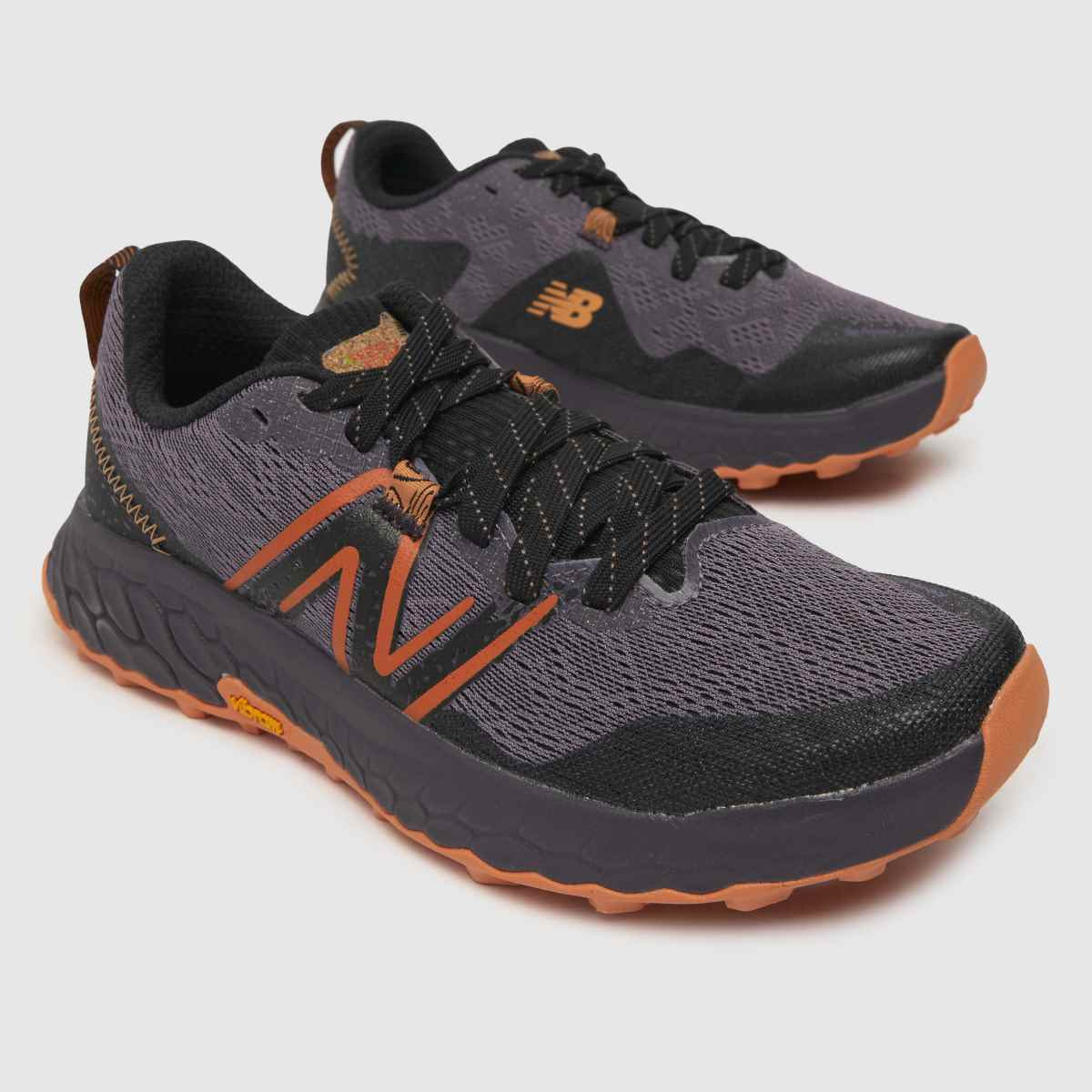 New Balance – Fresh Foam x Hierro V7 – Svarta och orangea träningsskor