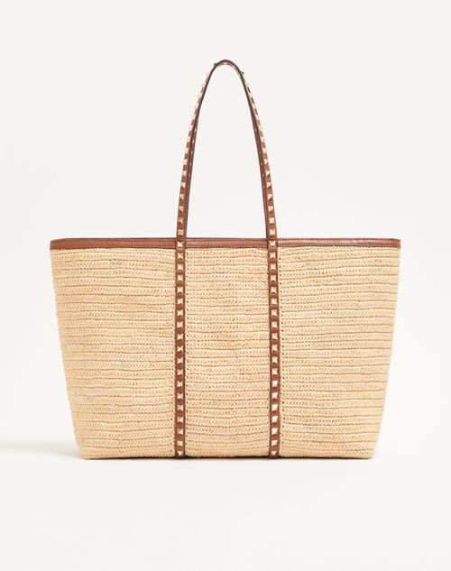 Bolsa de compras Valentino Garavani Rockstud em ráfia