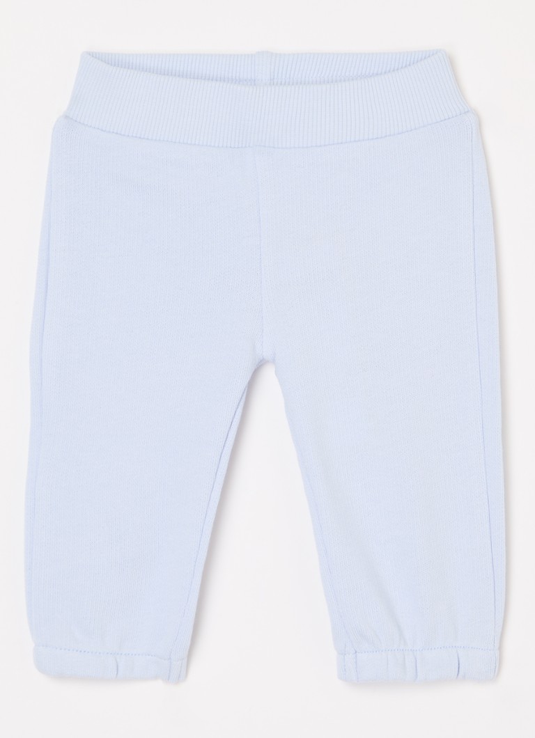 Pantaloni de trening Benetton cu croială conică și broderie.