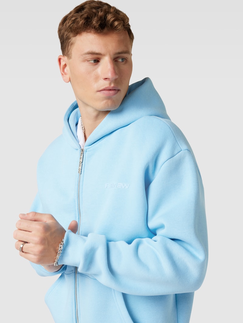 Sweatjacke mit Kapuze in hellblau