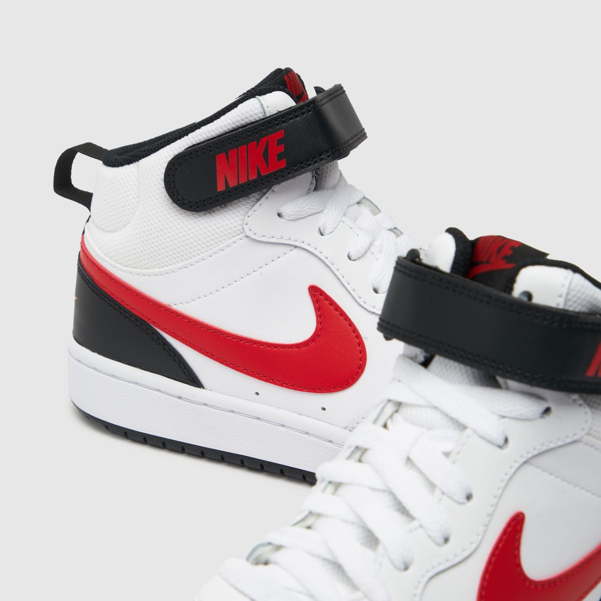 Nike vita och röda Court Borough Mid 2 ungdomsskor
