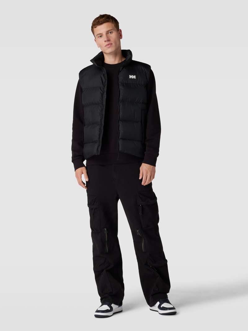 Steppweste mit Stehkragen und Eingrifftaschen in schwarz