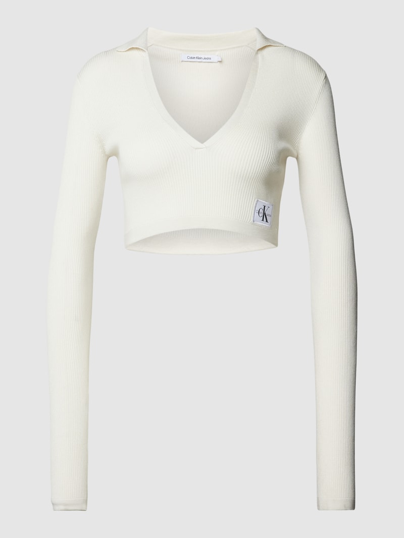 Cropped Strickpullover mit Label-Detail in ecru
