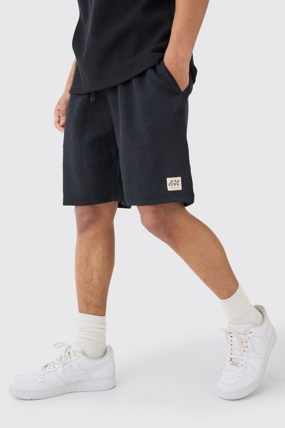 Lockere mittellange strukturierte Shorts