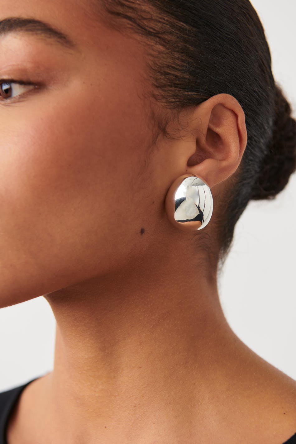 Uneven oversized earrings