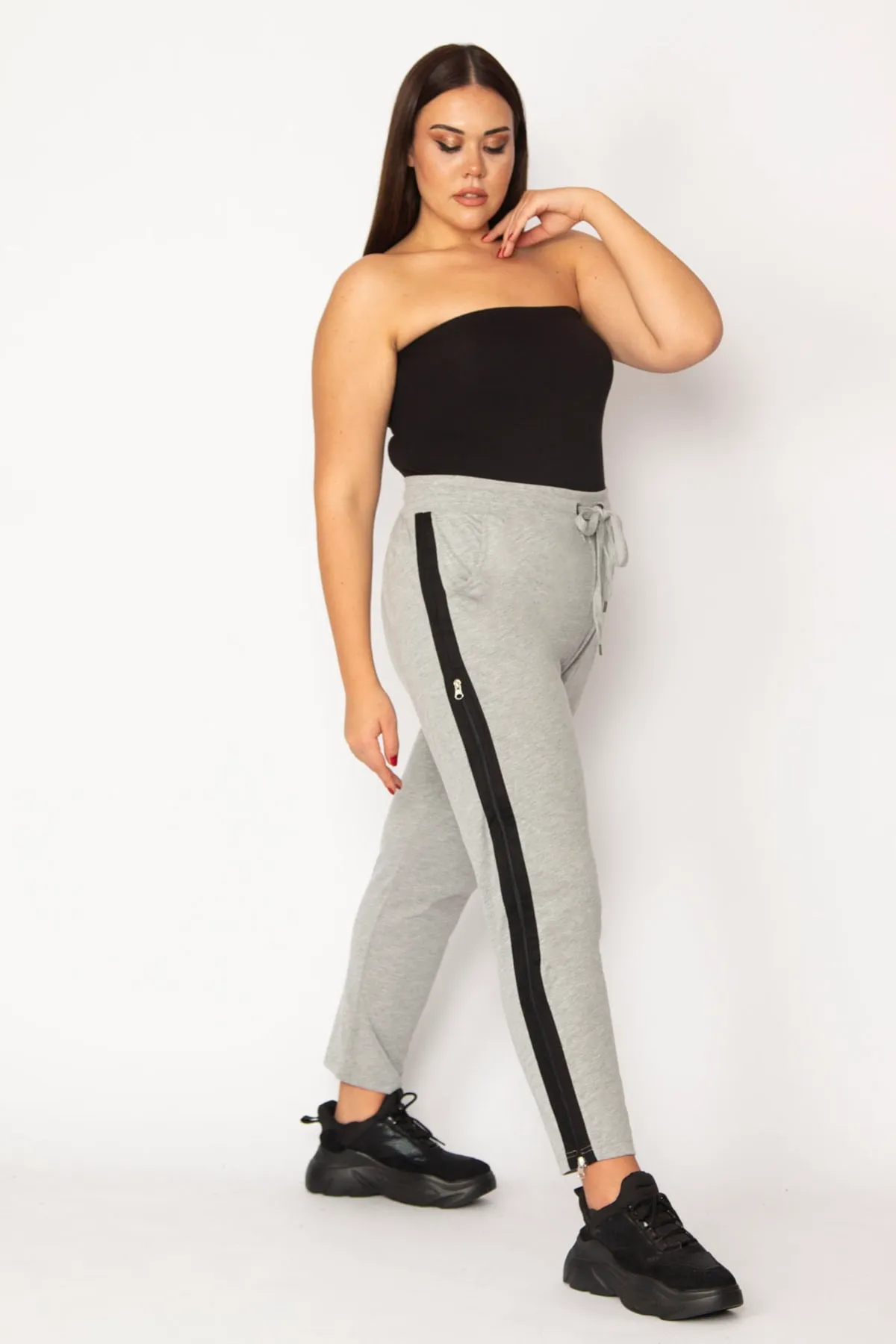 Şans  Graue Kombi-Hose mit Reißverschluss und elastischem Bund für Damen in großen Größen und beidseitiger Öffnung 65n29190