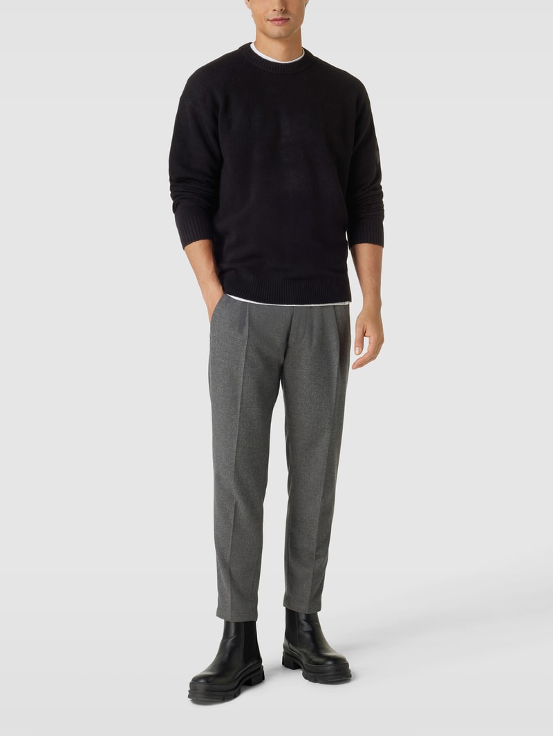 Strickpullover mit Label-Patch Modell 'LYCRA' in schwarz