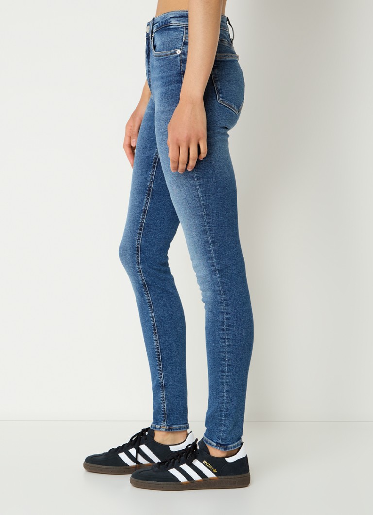 Jeans skinny a vita media Calvin Klein, lavaggio medio
