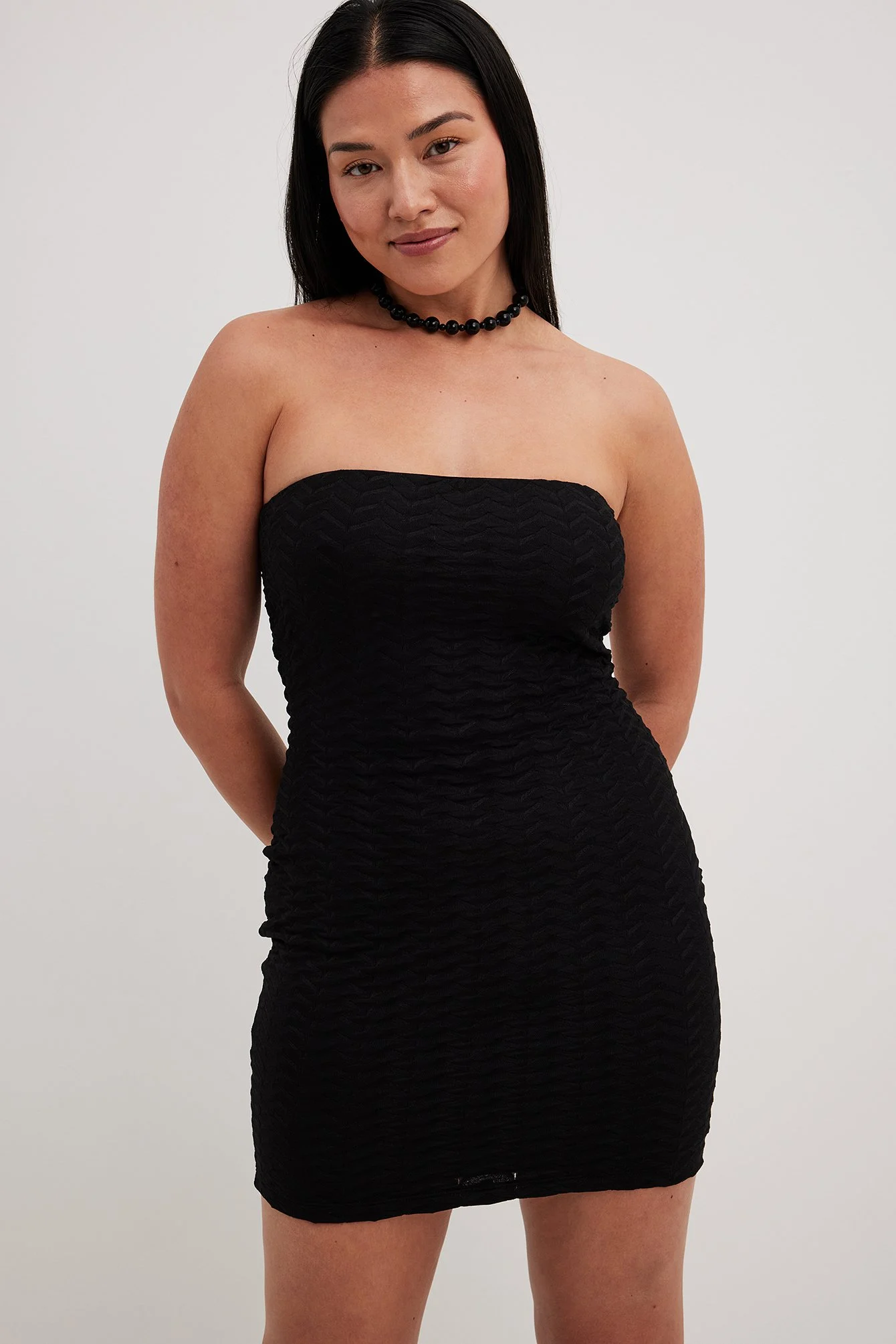 Strukturiertes Röhrenkleid