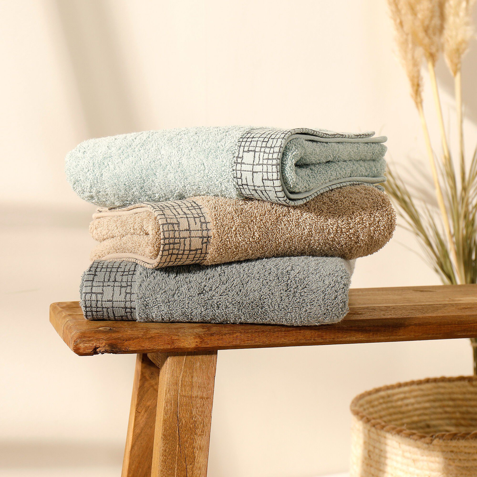 Serviette éponge liteau jacquard quadrillé