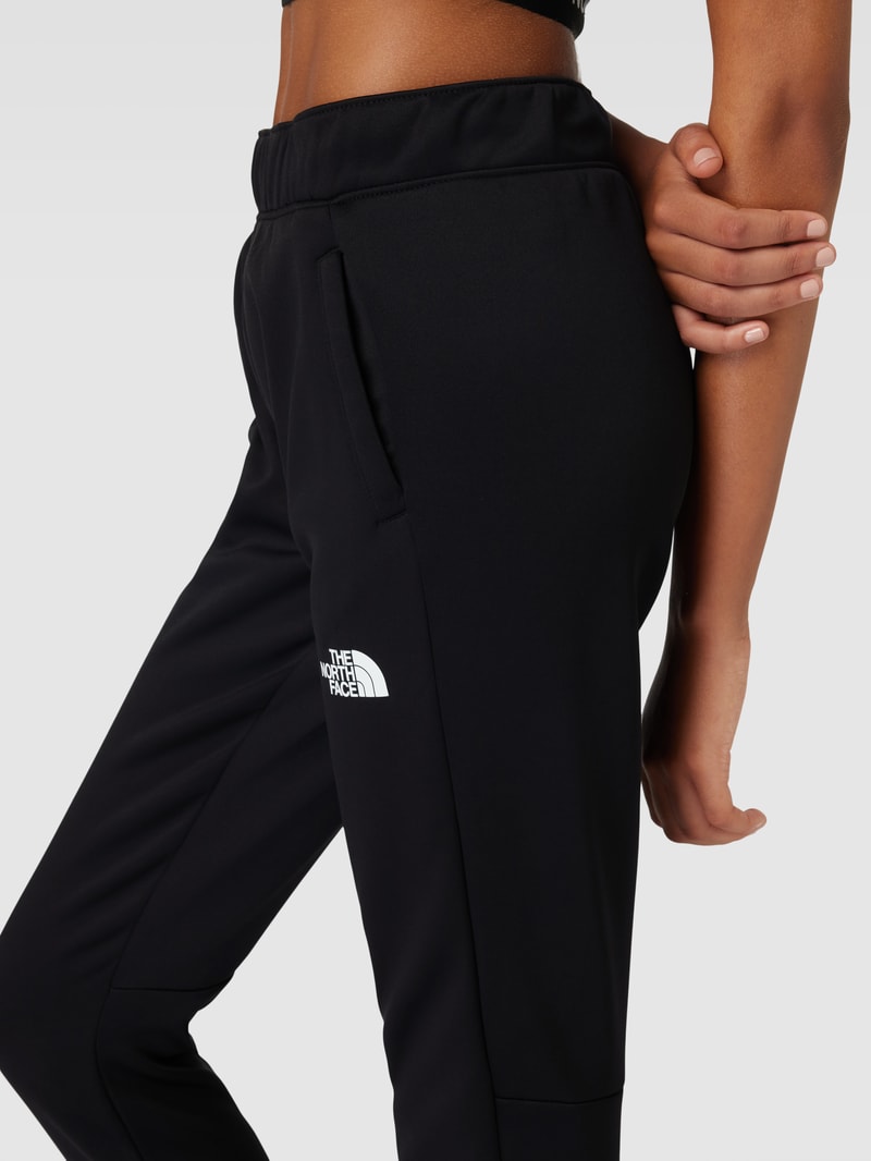 Sweatpants mit Label-Print Modell 'REAXION' in schwarz
