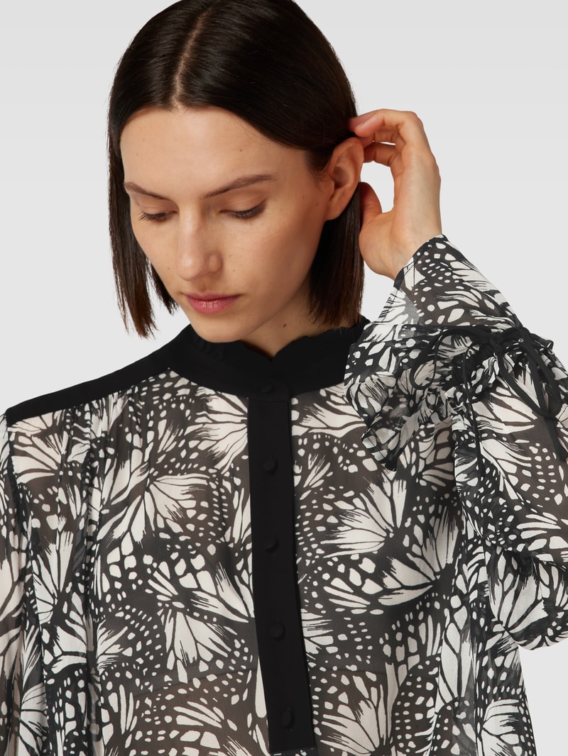 Bluse aus Viskose mit Allover-Muster in schwarz
