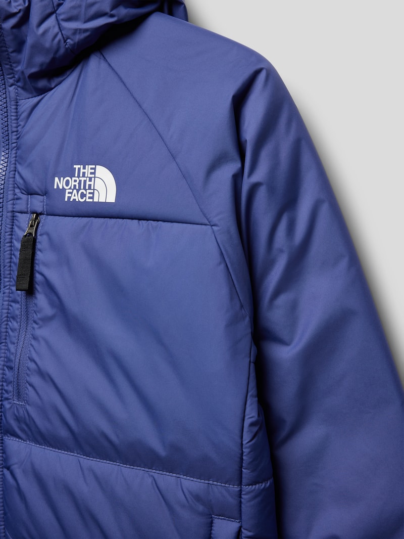 Steppjacke mit Wendefunktion und Label-Print in blau