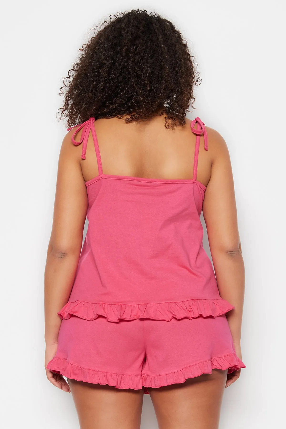 Trendyol Curve  Fuchsiafarbenes Pyjama-Set mit Strick- und Schnürdetails TBBSS22PT0564
