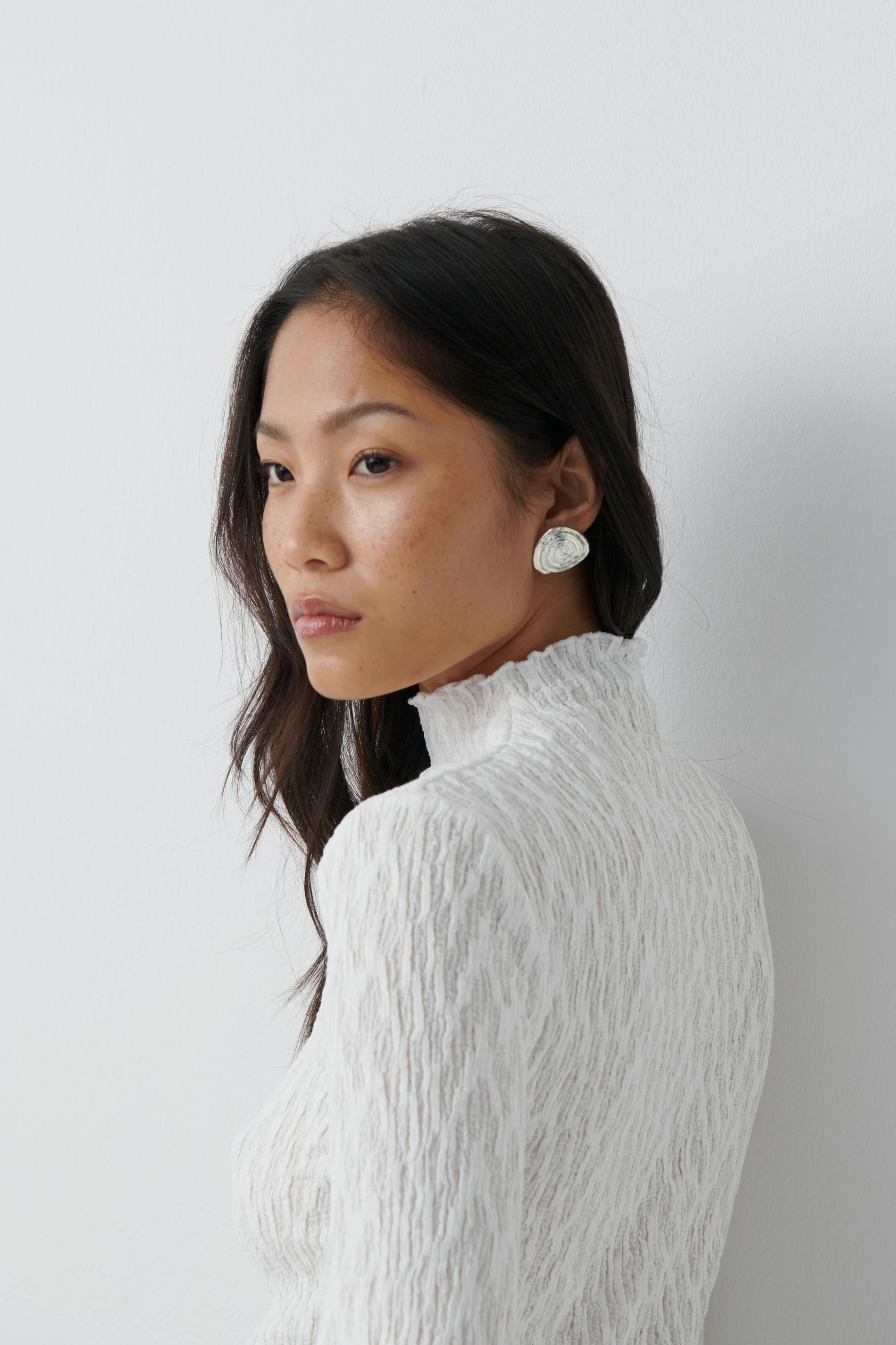 Textured funnel neck top