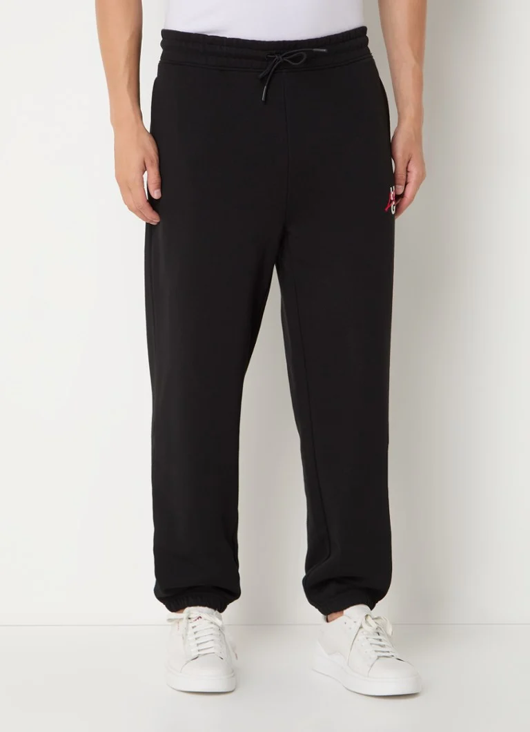Pantaloni de trening slim fit de la HUGO BOSS, cu logo și buzunare laterale.