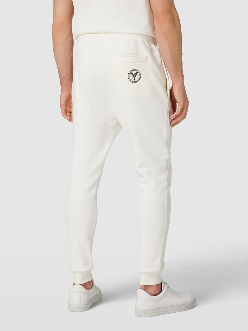 Sweatpants mit Label-Details in offwhite