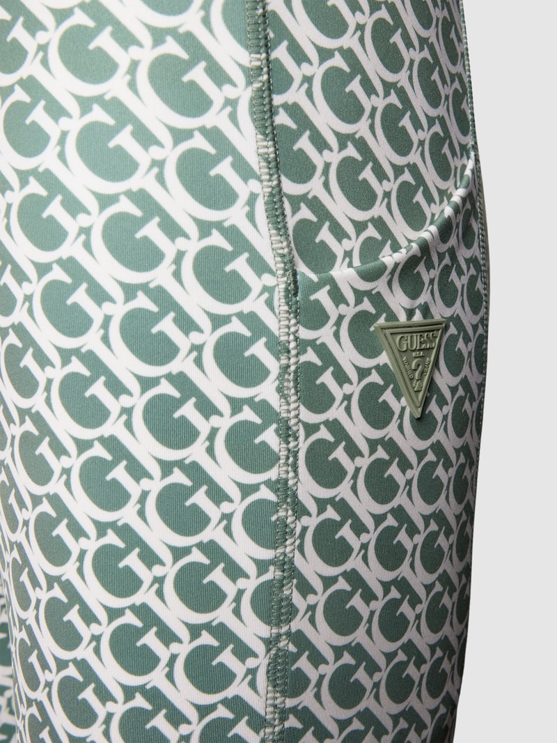 Leggings im Allover-Look Modell 'LOGOMANIA' in olivgrün