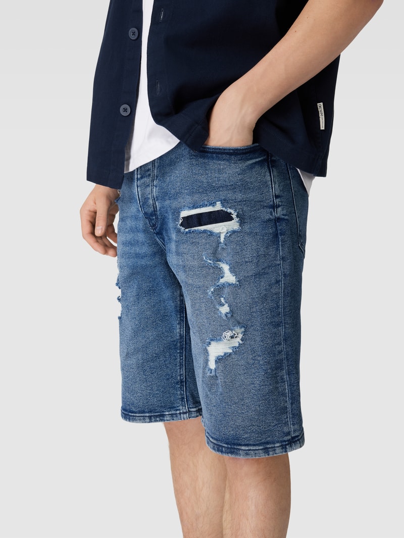 Jeansshorts im Destroyed-Look in blau
