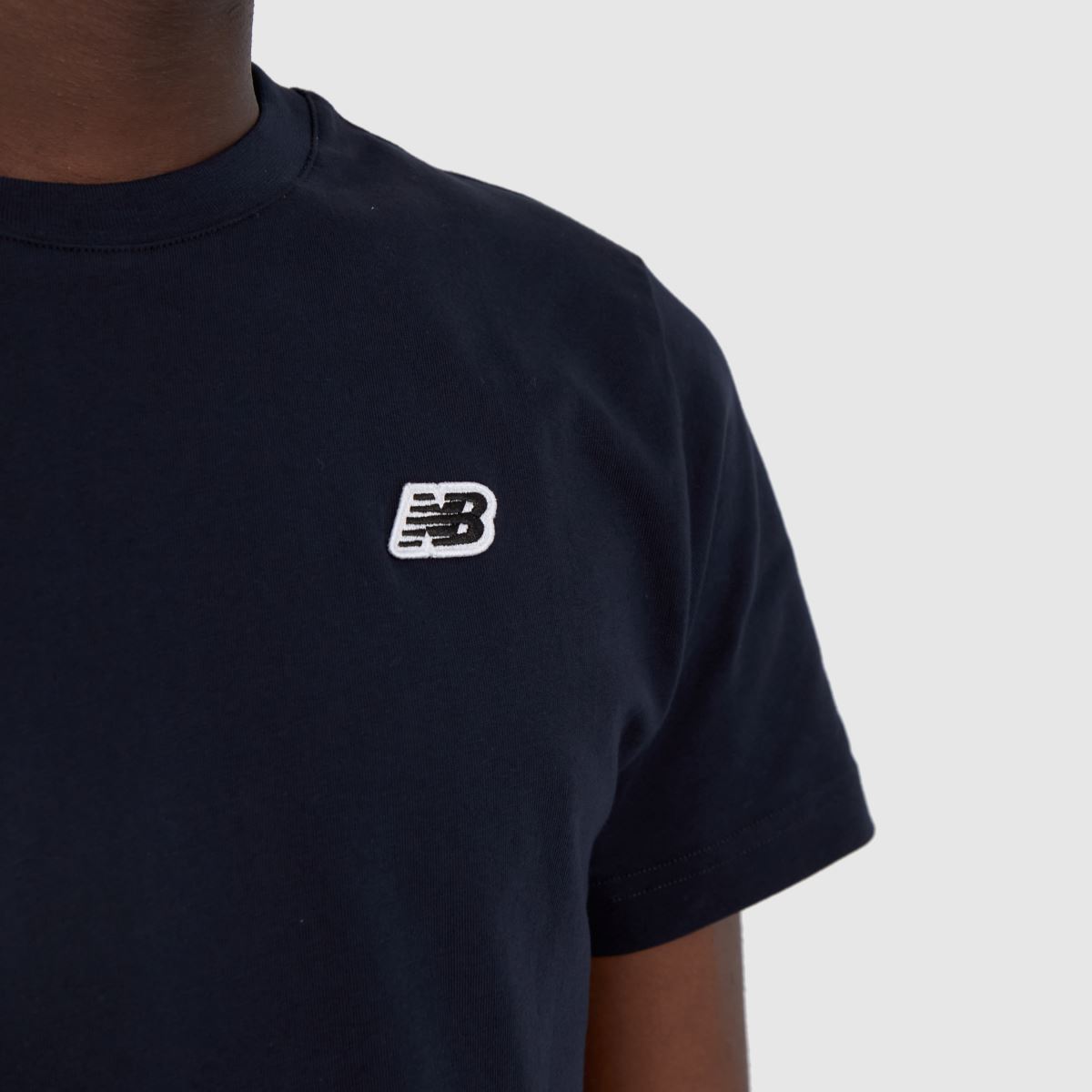 New Balance – Marinblå t-shirt med liten logga