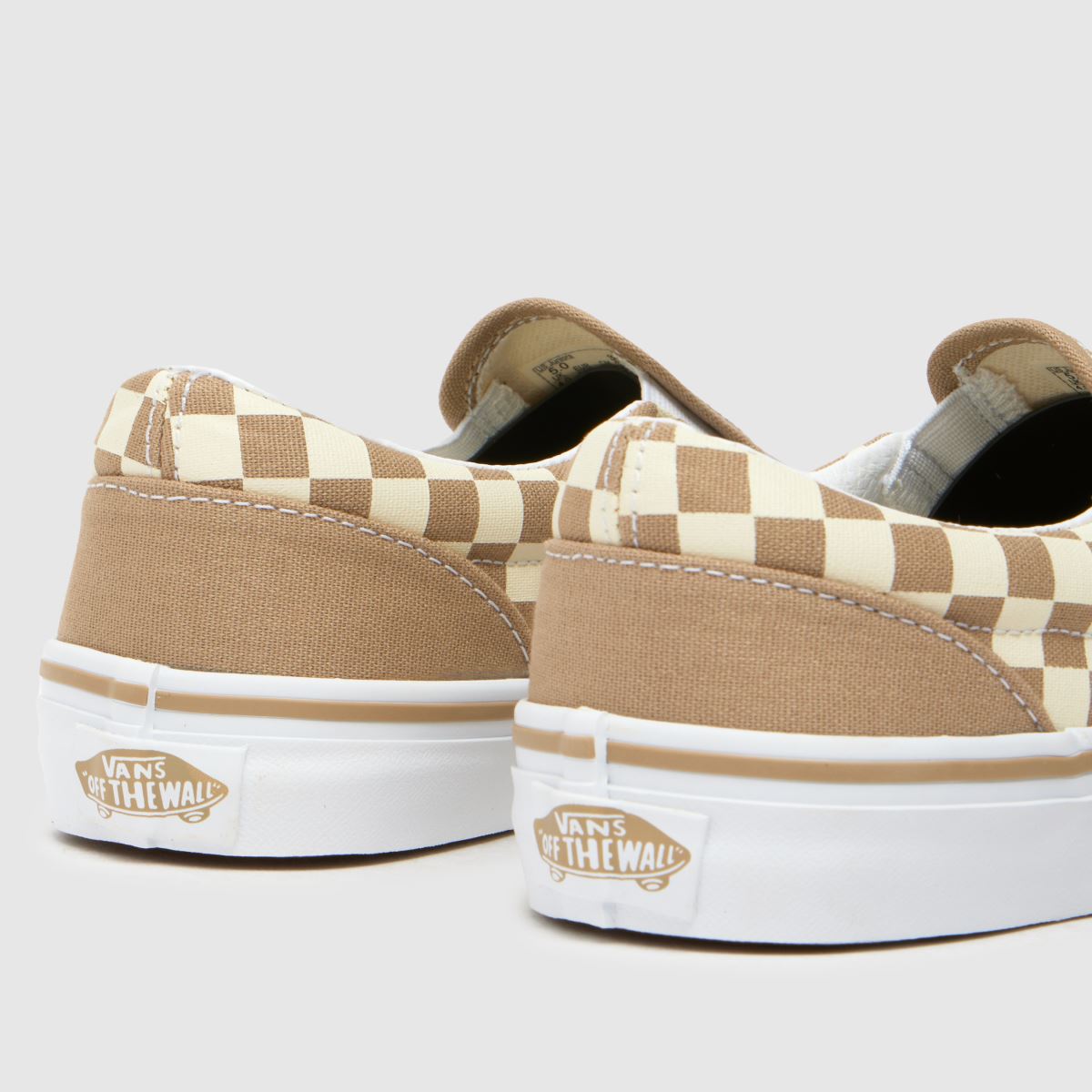 Vans vita och beige klassiska slip-on-sneakers för barn