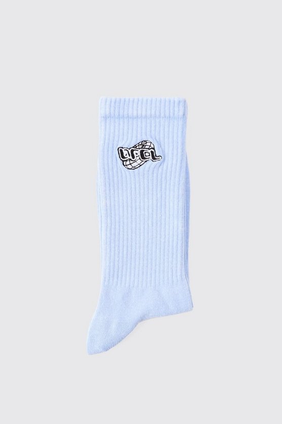 Hellblaue Socken mit Acid-Waschung und Official-Stickerei