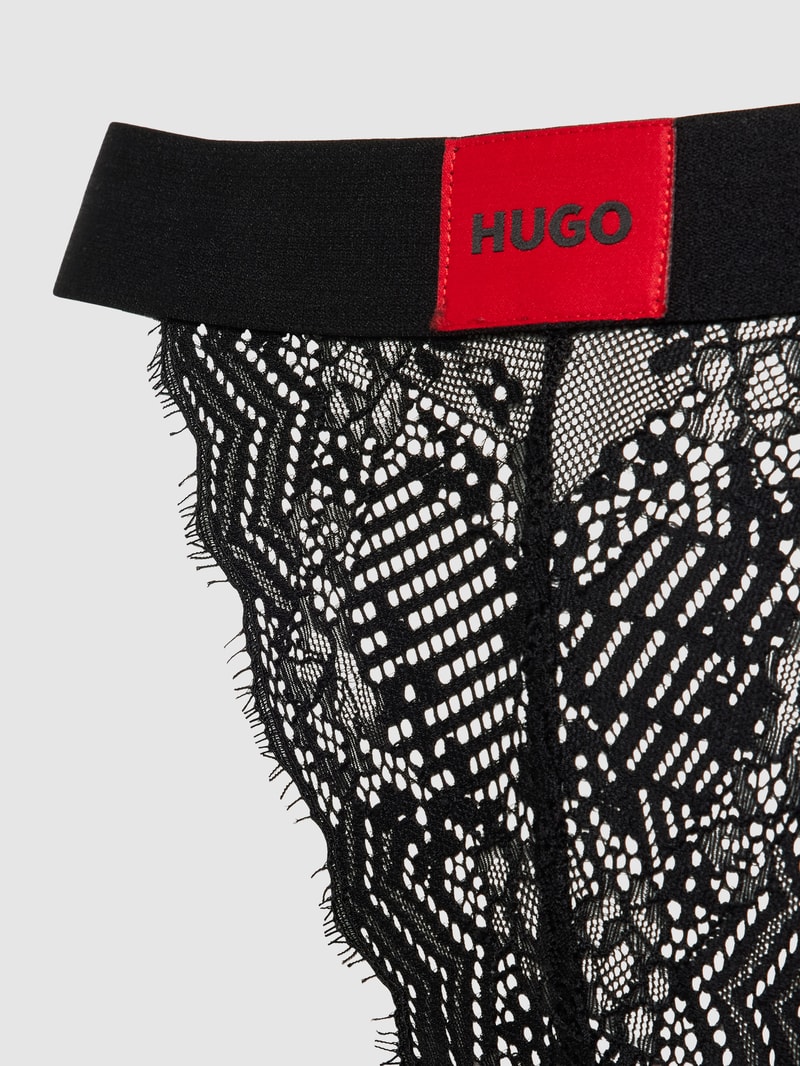 String mit Spitzenbesatz in schwarz