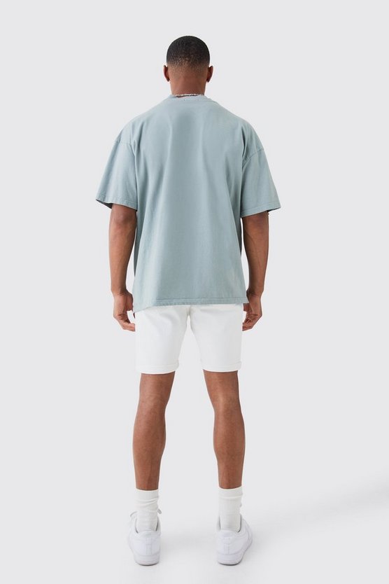Weiße Skinny Stretch Jeansshorts mit Rissen