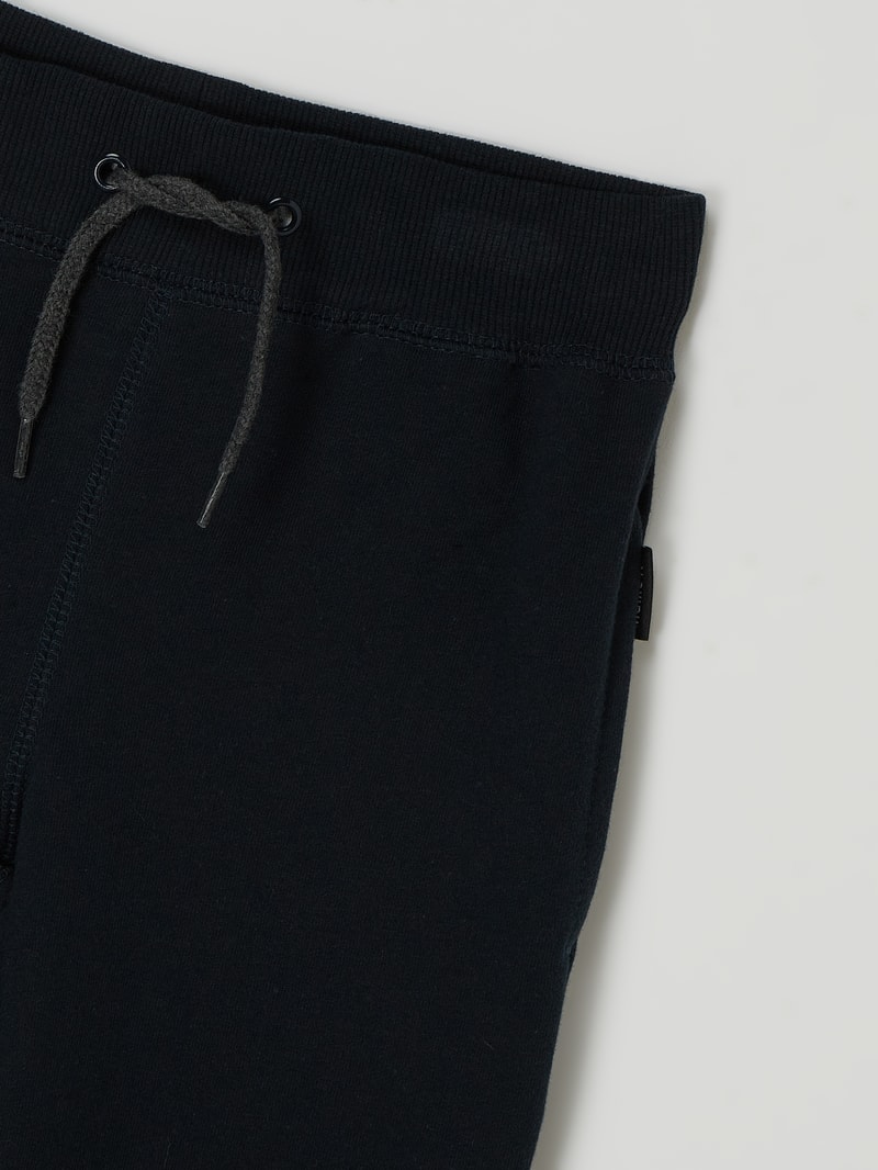Sweathose mit Logo-Detail in marineblau