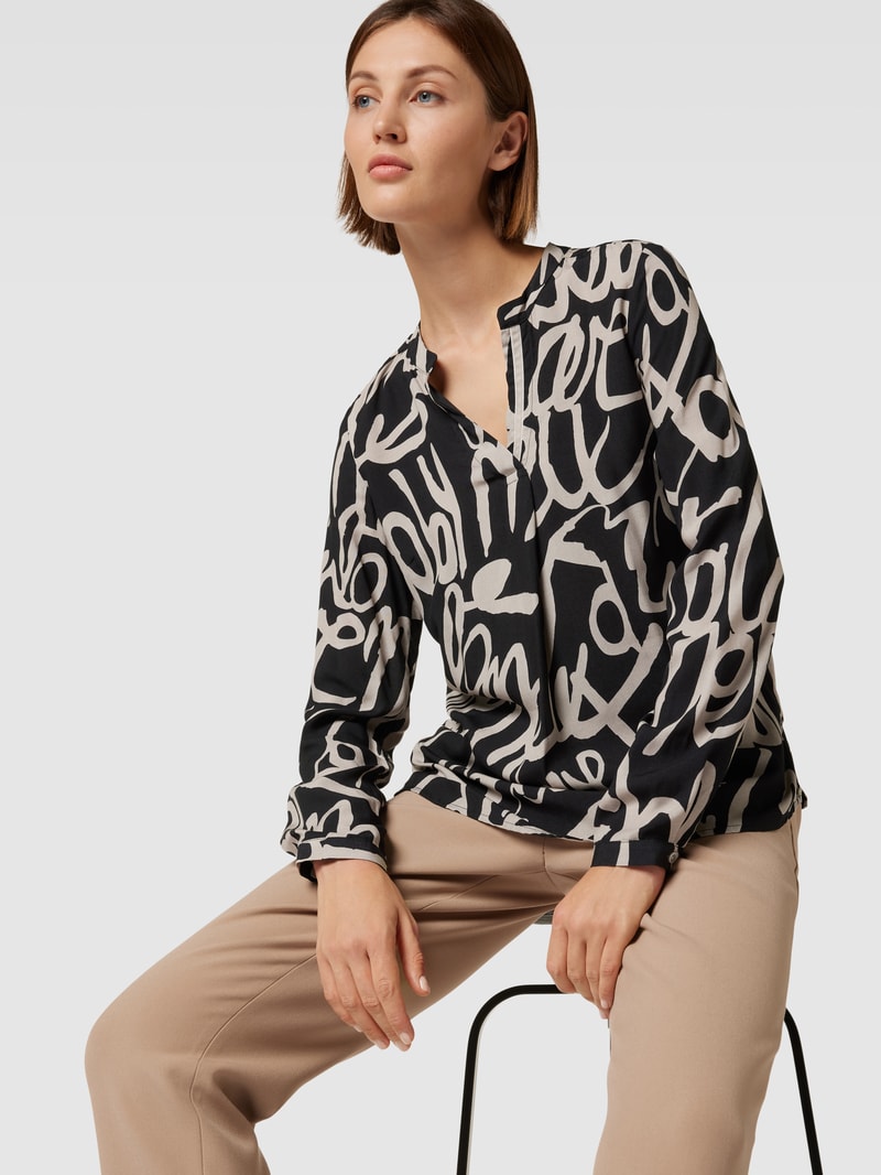 Blusenshirt mit Allover-Muster in schwarz