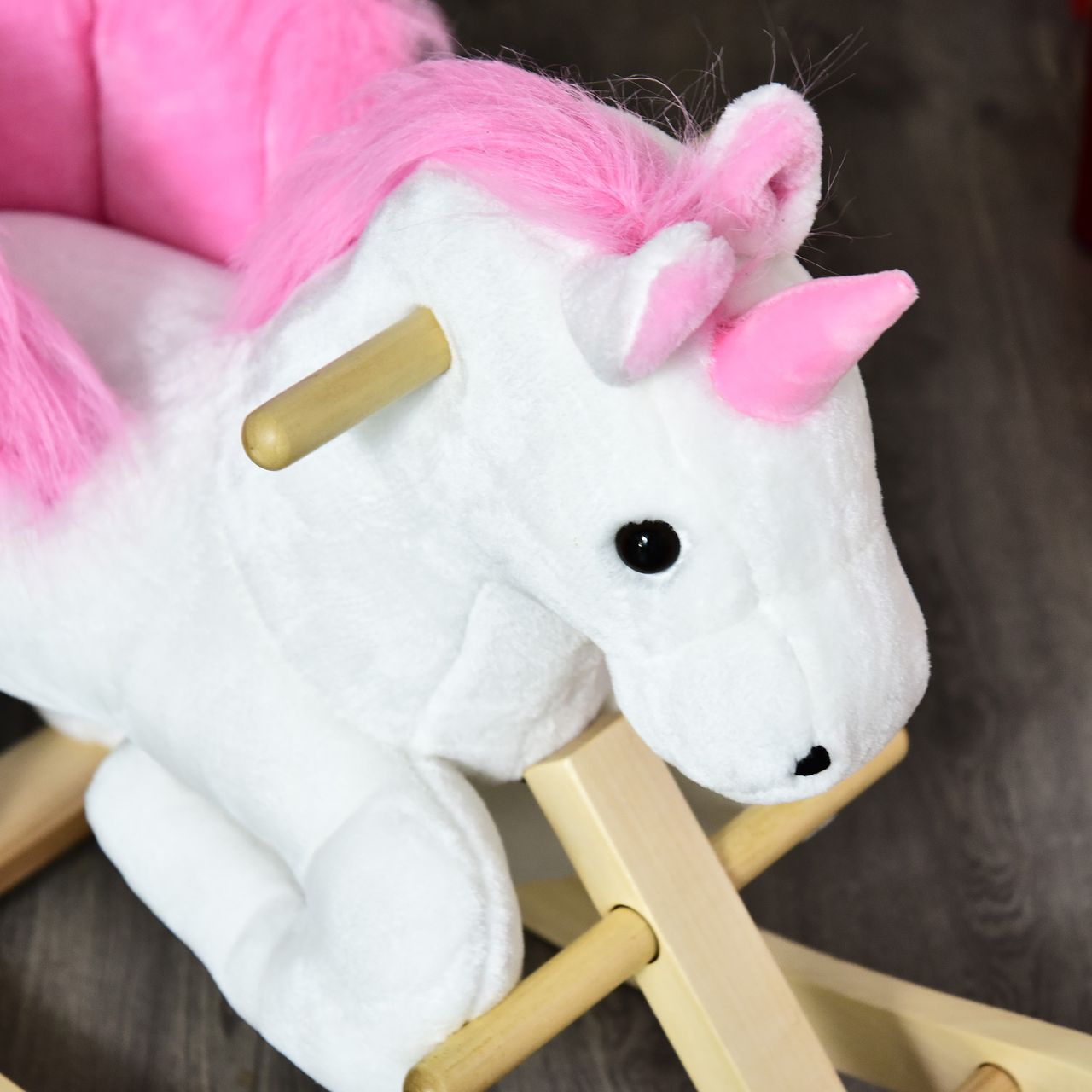 HOMCOM Schaukeltier Schaukelpferd Kinder Schaukel magisches Einhorn-Design mit Musik für Kinder für 18-36 Monate Baby Plüsch Holz Stahl Rosa Weiß 65 x 32 x 55 cm