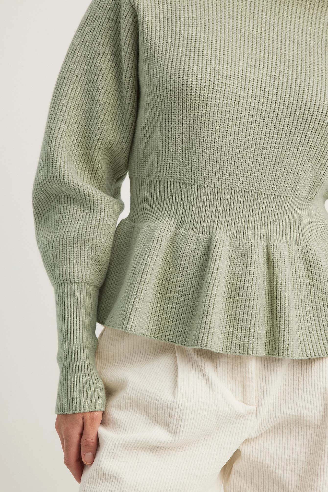 Strickpullover mit Schößchen