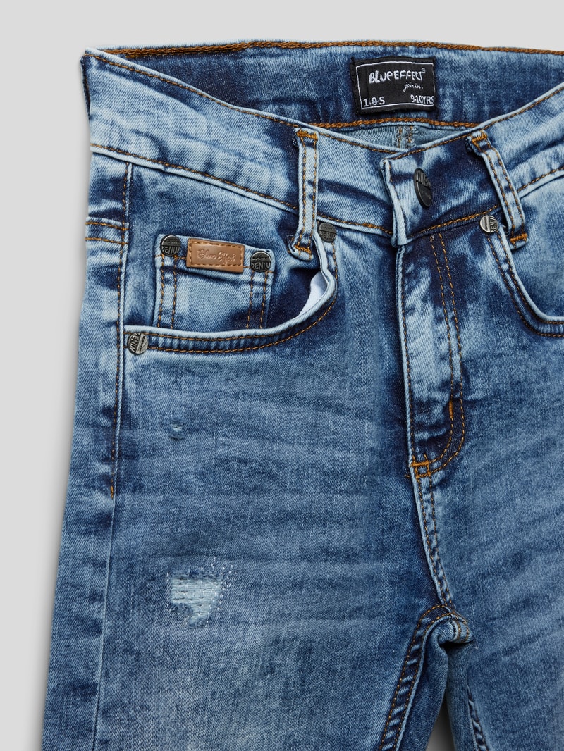 Jeans im Destroyed-Look in blau